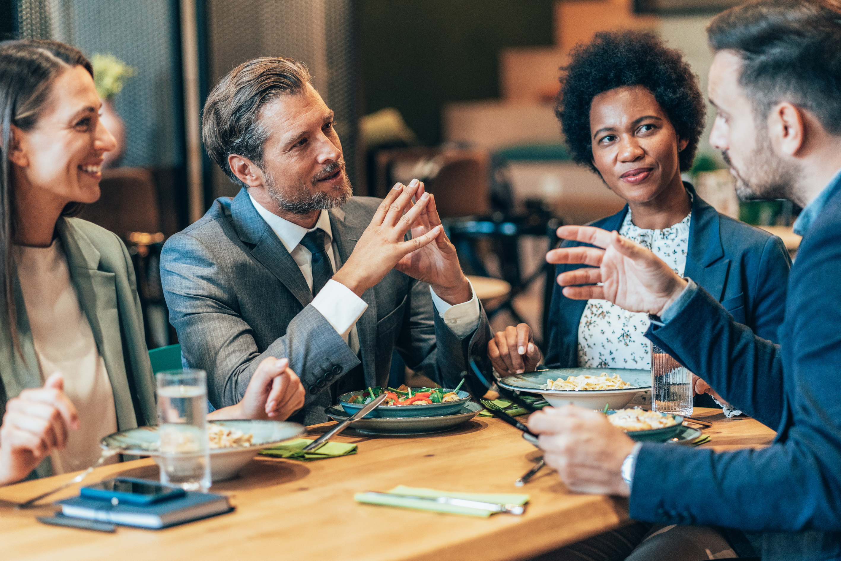 Staff having a business lunch at a hospitality venue