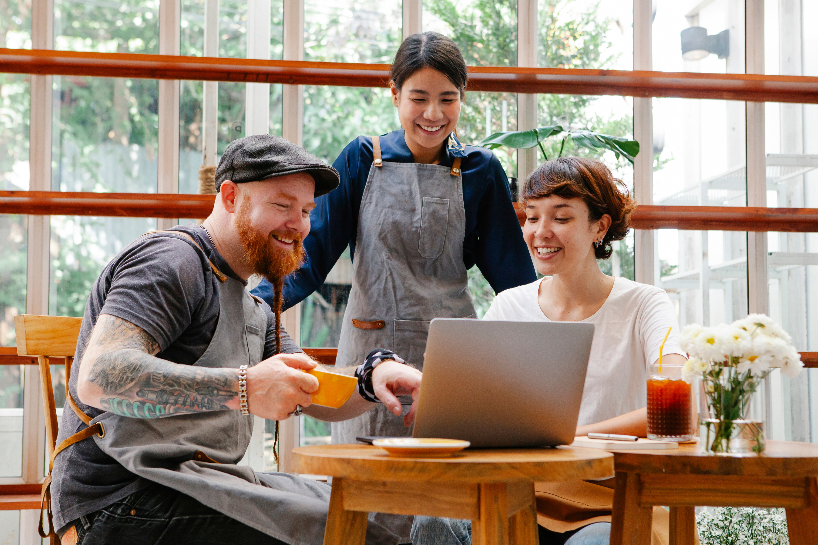 Student worker at cafe attending to customers